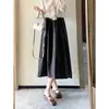 Falda de botón tridimensional estilo Hepburn hecha de tela de lana europea con bolsillos laterales, falda de otoño e invierno para mujer de longitud media B0829N