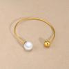 Joyería transfronteriza europea y americana al por mayor cuentas de acero inoxidable cuentas redondas de perlas pulsera abierta dorada B- 487G