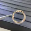 Versión de Gama Alta del Anillo Mobius Completo de Diamantes Gejia Anillo de Pareja Oro Rosa Lujo Accesible Moda Nicho Diseño de Anillo para Mujeres