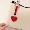Llavero de Corazón de Diamante Completo de Venta Caliente Cross Colgante de Bolso de Corazón de Melocotón con Pedrería Llavero de Coche Personalidad de Moda Colgante