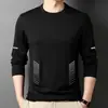 Camiseta casual versátil de manga larga para hombre para otoño, cuello redondo, color liso moderno, cómoda, transpirable y de corte holgado.