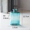 Jarrón pequeño transfronterizo de vidrio para escritorio, mini arreglo floral de boca pequeña, botella de vidrio de color hidropónico, adornos decorativos al por mayor