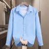 Camisa versátil de nicho sin planchado con tejido de burbujas en los hombros, camisa casual elegante de manga larga para hombre, color liso, para primavera y otoño