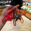 Nuevo Llavero Creativo de Imitación de Cuero con Forma de Estrella de Cinco Puntas y Colgante de Cuerda Tejida, Decoración para Mochila de Estudiante, Pequeño Juguete de Regalo