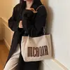 Bolso de Hombro Único de Gran Capacidad con Textura de Moda para Mujer 2025 Nuevo de Moda Estudiante Clase Viaje Diario Bolso Tote con Letras