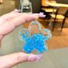 Nuevas cuentas de burbujas luminosas de aceite acrílico botella de arena movediza de flor de cerezo adornos de flores creativos colgante de bolsa al por mayor