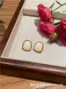 Pendientes de botón geométricos para mujer Otoño e Invierno 2023 Moda Nueva Pendientes estilo Western Pendientes de diseño de nicho con temperamento Accesorios de moda