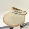 Nuevo sombrero de paja con encaje de estilo coreano de ala abierta para mujer, sombrero de protección solar para primavera y verano, sombrero de playa para vacaciones, sombrero de paja tejido, moderno