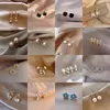 Versão coreana estilo TikTok de brincos de pérola populares para mulheres, luxo leve com sensação de alta qualidade, brincos versáteis de nicho, acessórios de orelha elegantes e modernos