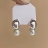 Pendientes para hombre con forma de estrella de amor cepillada esmerilada 2025 nuevo popular de lujo ligero alta gama pendientes con clip para oreja femenino nicho único