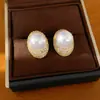 Pendientes de aguja plateada con circonita y perlas ovaladas, estilo vintage francés, versátiles y elegantes, lujo ligero y sensación de alta gama