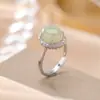 Anillo Versátil Simple Elegante Geométrico Ovalado de Plata de Ley S925 Yilu con Jade Natural Hetian Jade de Agua Clara