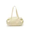 La popular bolsa tipo almohada de estilo perezoso de este año para mujer es el nuevo modelo de verano 2026, un bolso de hombro simple de color liso y un bolso de axila moderno