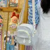 Bolsa pequeña estilo japonés de verano para mujer 2026 nuevo modelo multibolsillos ligera bandolera para caminar y ocio bolsa para teléfono móvil bolso de hombro
