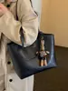 Yuezi 2026 Otoño/Invierno Nueva Bolsa Retro de Gran Capacidad Bolso de Hombro Individual Casual para el Trabajo Bolso Tote Texturizado Simple Versátil