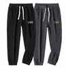 Pantalones de hombre 2025 nuevo primavera y otoño pana jogger casual estilo otoño puro hombres retazos pantalones deportivos