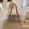Transfronteiriça novo 2026 design de nicho color-blocking patchwork de jeans desgastado bolsa de ombro única bolsa de mão bolsa tiracolo moderna