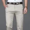 Pantalones casuales de algodón puro de marca para hombre, pantalones rectos holgados elásticos sin arrugas para otoño e invierno, pantalones negros gruesos de cintura alta
