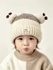 Gorro de tricô com blocos de cor de panda e duas bolinhas para crianças, outono e inverno, unissex, gorro de lã com blocos de cor para bebês, fofo com pompom, quente para bebês