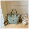 Bolso de mano simple transfronterizo para mujer, nuevo bolso cubo casual de lona estilo coreano, bolso de hombro y cruzado elegante y versátil