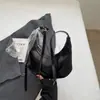 Bolso de Mano Retro de Textura de Alta Gama Tipo Bolita para Mujer 2026 Estilo Nuevo de Primavera Bolso de Hombro Cruzado Elegante de Nicho de Lujo Ligero