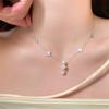 Novo colar de pérolas com zircônia e flor de quatro folhas com diamante flash feminino, corrente cruzada de nicho de luxo leve e luxuoso, atacado ao vivo