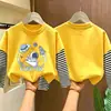 Camiseta de manga larga para niño 2026 nuevo modelo, camiseta básica de dibujos animados para niño, camiseta interior de algodón puro a rayas para otoño, estilo primavera y otoño