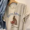 Camiseta Redonda Manga Curta Estampa de Desenho Animado Retro Americana Design de Verão 2026 Novo Estilo Blusa Solta de Meia-Manga