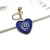 Llavero de Ojo de Diablo con Forma de Corazón Incrustado de Diamantes Doble Cara Transfronterizo Colgante para Llavero de Coche Corazón de Melocotón con Pedrería Decoración para Bolso
