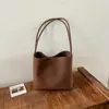 Bolso de mano transfronterizo estilo vintage, nuevo modelo otoño 2026 para mujer, bolso de hombro minimalista de nicho para el día a día con monedero a juego