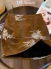 Falda corta vintage de lentejuelas con bordado pesado para mujer, otoño 2026 nueva falda corta de cintura alta adelgazante línea A A14154