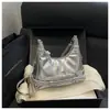 Bolso de axila de cuero suave brillante de alta gama para mujer, nuevo bolso de hombro de moda de verano 2026, bolso cruzado versátil para el día a día
