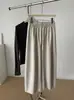 Calça casual de cintura alta estilo coreano, que valoriza a silhueta, de perna larga e cropped para mulheres, coleção outono 2026, com cordão, bolsos e design liso, apresentando uma leve curva na barra