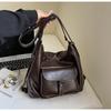 2025 Nuevo Estilo Coreano Bolso Tote Simple de Gran Capacidad Mochila Estilo Motocicleta con Hebilla de Cinturón Personalizada para Mujer