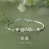 Suministro en stock Pulsera de Flor de Jazmín Moli Modelo para Mujer Estilo Bosque Floral Cadena de Semilla de Melón Exquisita Joyería de Mano de Nicho de Lujo Ligero Venta al por mayor