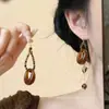 Brincos redondos com gotas de óleo estilo Maillard, luxo leve, alta qualidade, modernos, ear cuffs simples, elegantes e versáteis, brincos de nicho para mulheres
