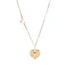 Nuevos accesorios transfronterizos de moda, collar sencillo con forma de corazón de acero de titanio y colgante de corazón de melocotón, cadena para mujer
