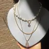 Colar de Pérolas com Pingente Olho de Diamante Estilo Europeu e Americano Design de Nicho Feminino Corrente de Clavícula Multicamadas Elegante de Alta Qualidade