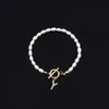 Pulsera de Moda de Venta Caliente Transfronteriza 2026 con Diamantes y 26 Letras, Pulsera de Perlas de Imitación Ovaladas, Disponible para Venta al por Mayor para Mujeres