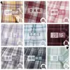 2024 nueva colección japonesa uniforme JK falda a cuadros traje de manga corta para mujer falda plisada uniforme escolar jk para estudiante venta al por mayor generación