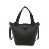 Bolso Pequeño Tipo Cubo para Mujer, Nuevo Estilo Coreano Nicho Piel Suave de PU Versátil para el Trabajo Casual Bolso de Hombro Bolso Cruzado