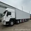 Fornecimento Transfronteiriço de Caminhões Porta-Contêineres Sinotruk Howo Norma de Emissão Euro II Euro III Veículo Novo Padrão 8x4 Furgão