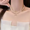 Collar de Cadena para Clavícula de Mujer con Perlas Redondas Espaciadoras, Ojo de Gato con Diamantes Completos, Cola de Pez, Estilo de Lujo Ligero, Diseño de Nicho, Temperamento