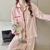 Cardigan de punto de imitación de algodón de alta densidad para principios de otoño, conjunto de pijama de manga larga y pantalón largo para mujer con copas en el pecho, ropa de casa linda, transfronterizo