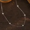 Collar de Plata de Ley 925 con Flor de Trébol de Cuatro Hojas Incrustada con Diamantes Estilo Nuevo Cielo Estrellado Súper Brillante Nicho de Gama Alta Versátil para Mujer Collar de Zirconia