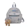 Nuevo Estilo Galleta Guiñando Colgante de Felpa Oscilante Encanto para Bolsos Lindo Accesorio para Mochila Llavero Colgante Pequeño