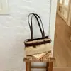 Bolso de axila de diseño nicho transfronterizo para mujer, nuevo bolso tote casual y elegante 2026 para ir al trabajo