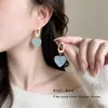 Pendientes frescos y dulces estilo vacacional con borlas florales, borlas de perlas estilo francés, pendientes llamativos de lujo ligero y alta gama