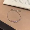 Pulseira de Diamante Retrátil em Forma de Coração com Zircônia Rosa Incrustada em Prata para Mulheres, Estilo Menina Doce, Joia Versátil para o Dia a Dia, Atacado