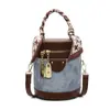 Bolso de Hombro Simple Casual Bolso Cubo de Mano de Nicho para Mujer 2026 Nuevo Bolso Cruzado Elegante de Alta Gama con Textura de Moda